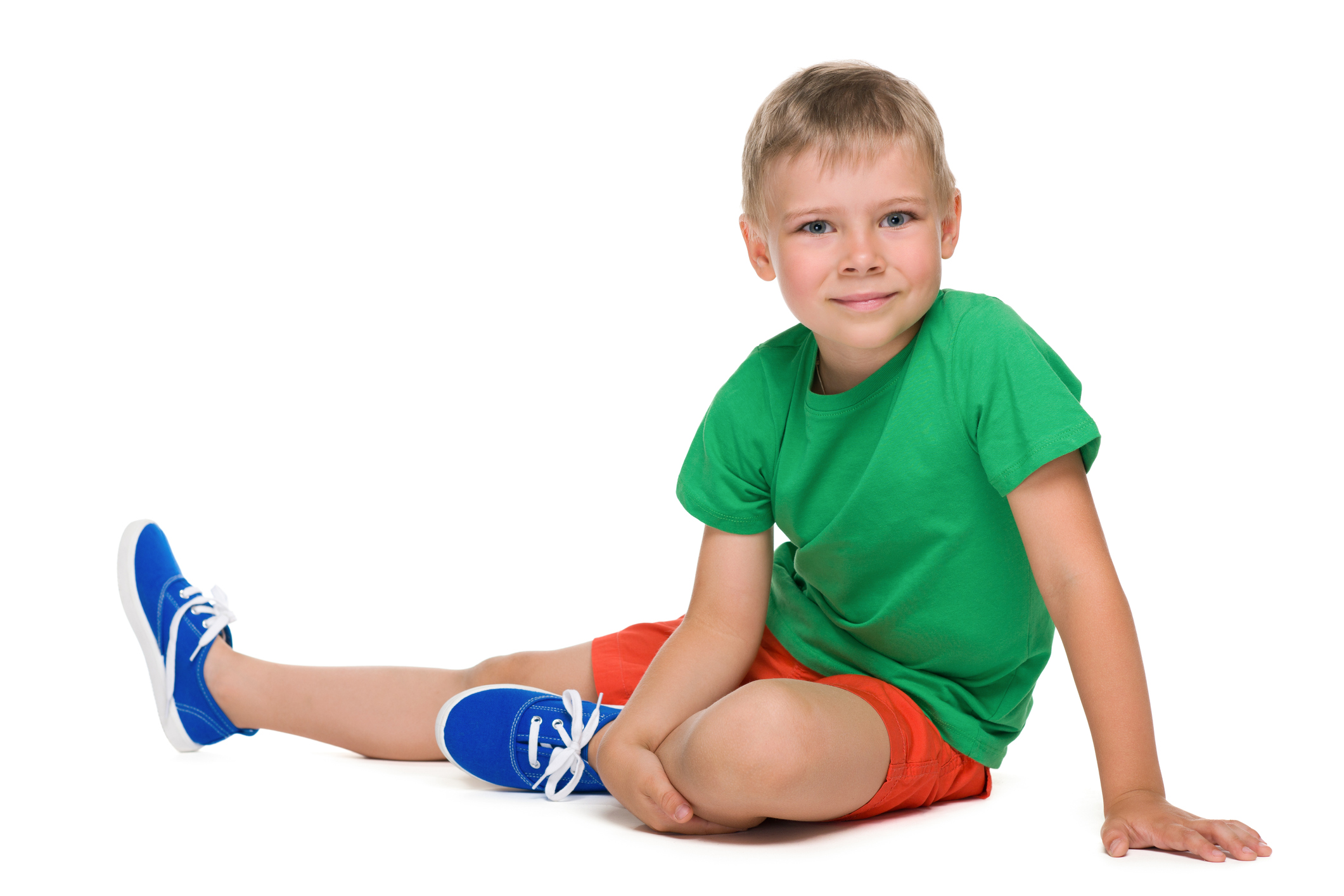 Boy in colourful tshirt isolated on white